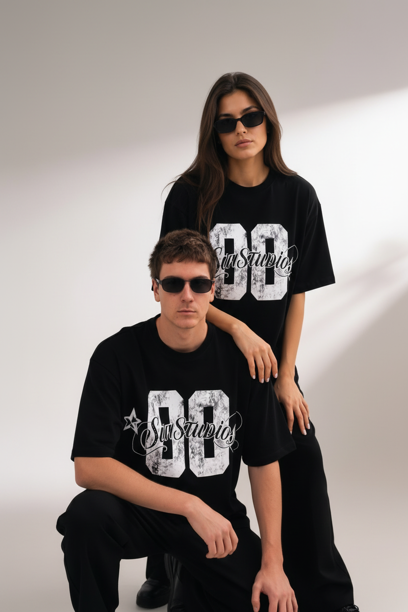 Guy kneeling girl arm on shoulder SavStudios tee